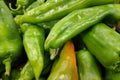 Stack of green ox horn peppers on a market stall Royalty Free Stock Photo