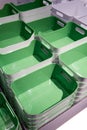 Stack of green plastic trays arrangement for background Royalty Free Stock Photo