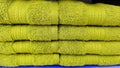 Pile of Green Towel at factory outlet Royalty Free Stock Photo