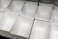 Stack of grey plastic trays arrangement for background. Royalty Free Stock Photo