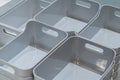 Stack of grey plastic trays arrangement for background. Royalty Free Stock Photo