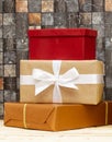 Stack of handcrafted gift boxes on wood table Royalty Free Stock Photo