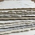 The sheets vary slightly in color, ranging from off-white to light gray Royalty Free Stock Photo