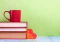 Stack of hardback books, diary on wooden deck table and green background. Back to school. Copy Space. Education Royalty Free Stock Photo