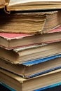 Stack of hardcover old books with on a dark background. Bookshelf shop, Knowledge publications, literature. Bookish bookstore