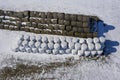 Stack of hay bales in winter near farm, aerial Royalty Free Stock Photo