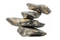 Stack of heavy rocks balancing precariously, isolated on a clean white background Royalty Free Stock Photo