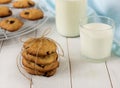 Stack of homemade cookies with chocolate pieces and milk. Royalty Free Stock Photo