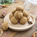Stack of homemade oatmeal cookies. Christmas healthy cookies, biscuits. Rustic wooden table. Winter decoration Royalty Free Stock Photo