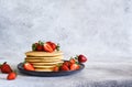 Stack of honey pancakes, homemade strawberry pancakes