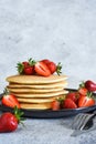 Stack of honey pancakes, homemade strawberry pancakes