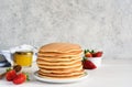 Stack of honey pancakes, homemade strawberry pancakes