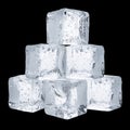 Stack of Ice Cubes Arranged in a Pyramid Shape Indoors on a Bright Surface Royalty Free Stock Photo