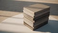 Stack of Identical Beige Zippered Folios on a Table Royalty Free Stock Photo