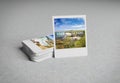 Stack of instant photos on concrete surface 3D rendering