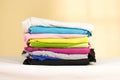 Stack of ironed colored linen. Pile of clothes. Ironing concept. Royalty Free Stock Photo