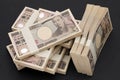 Stack of Japanese yen. 10,000 yen bundle of bills. Royalty Free Stock Photo