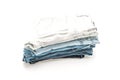 stack of jeans folded on white background Royalty Free Stock Photo
