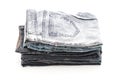 stack of jeans folded on white background Royalty Free Stock Photo