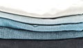 stack of jeans folded on white background Royalty Free Stock Photo