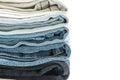 stack of jeans folded on white background Royalty Free Stock Photo