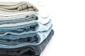 stack of jeans folded on white background Royalty Free Stock Photo