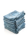 stack of jeans folded on white background Royalty Free Stock Photo