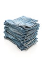 stack of jeans folded on white background Royalty Free Stock Photo