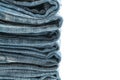 stack of jeans folded on white background Royalty Free Stock Photo
