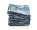 stack of jeans folded on white background Royalty Free Stock Photo