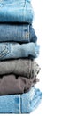 Stack of jeans isolated on white background. Clipping path included Royalty Free Stock Photo
