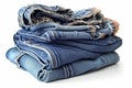Stack of jeans isolated on white background. Clipping path included Royalty Free Stock Photo