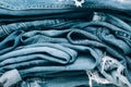 Stack of jeans on table. Zero vaste concept Royalty Free Stock Photo