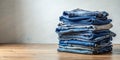 Stack of jeans on table Zero vaste concept Ecology and recycling Creative AI Royalty Free Stock Photo