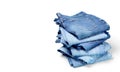 Stack jeans on white background Royalty Free Stock Photo