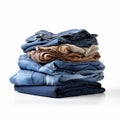 Stack Of Jeans On White Table Royalty Free Stock Photo