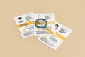 Stack of job applications with magnifying glass Royalty Free Stock Photo