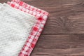 Stack of kitchen towels on wooden background Royalty Free Stock Photo
