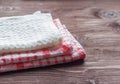 Stack of kitchen towels on wooden background Royalty Free Stock Photo