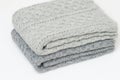 A stack of knitted plaids Royalty Free Stock Photo