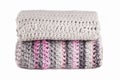 Stack of knitted scarfs isolated on white background Royalty Free Stock Photo
