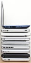 Stack of laptops depicting technology evolution and planned obsolescence Royalty Free Stock Photo
