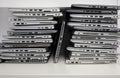 Stack of laptops in the storage room of a company Royalty Free Stock Photo