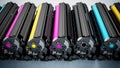 Stack of laser printer CMYK toners. 3D illustration Royalty Free Stock Photo