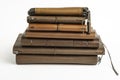 A Stack Of Leather-Bound Journals, Notebooks, Wallets & Cases Royalty Free Stock Photo