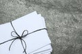 Stack of letters tied with string on table, top view. Space for text Royalty Free Stock Photo