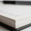 Of a stack of lined paper featuring a blue horizontal line and Royalty Free Stock Photo