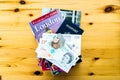 London travel books, US passport and British money on a table Royalty Free Stock Photo