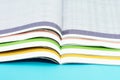 Stack of magazines on blue background Royalty Free Stock Photo
