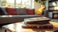 Stack of magazines rests on a wooden coffee table in sunlight Royalty Free Stock Photo
